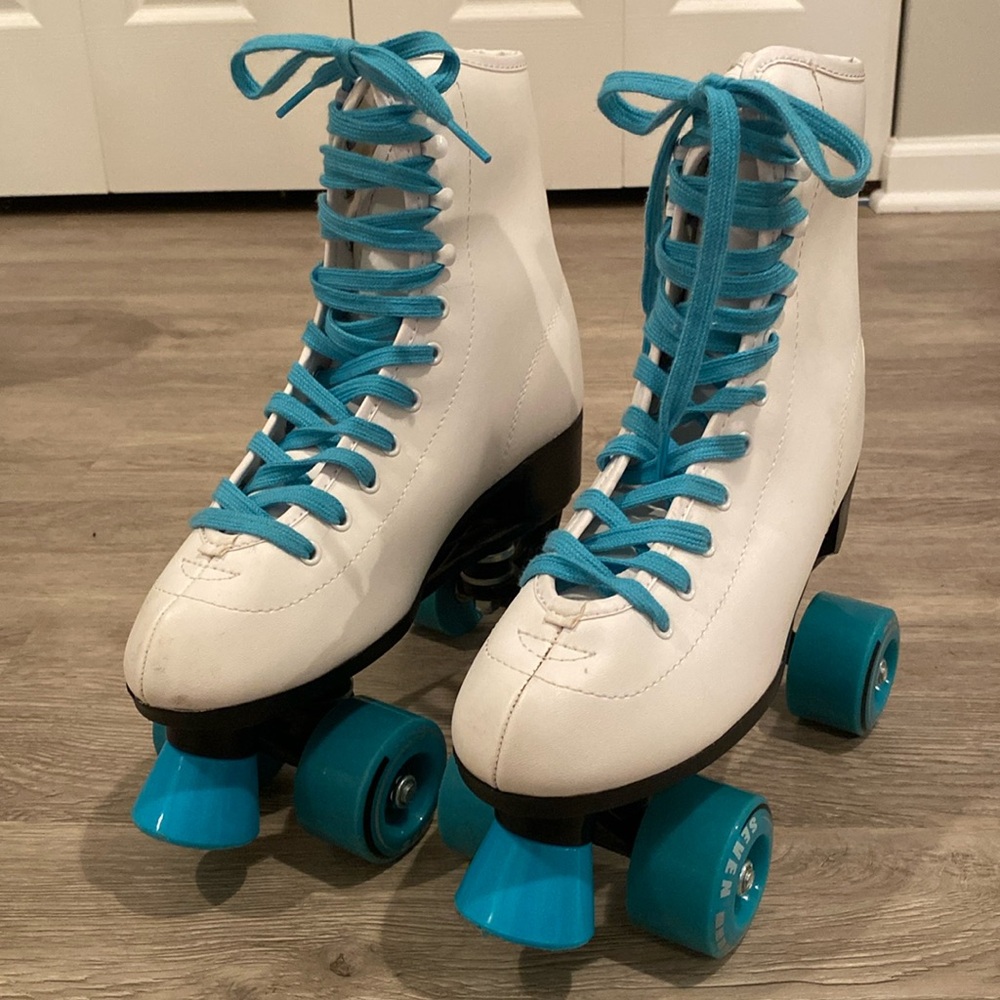 White and teal women’s size 6 roller skates by C Seven